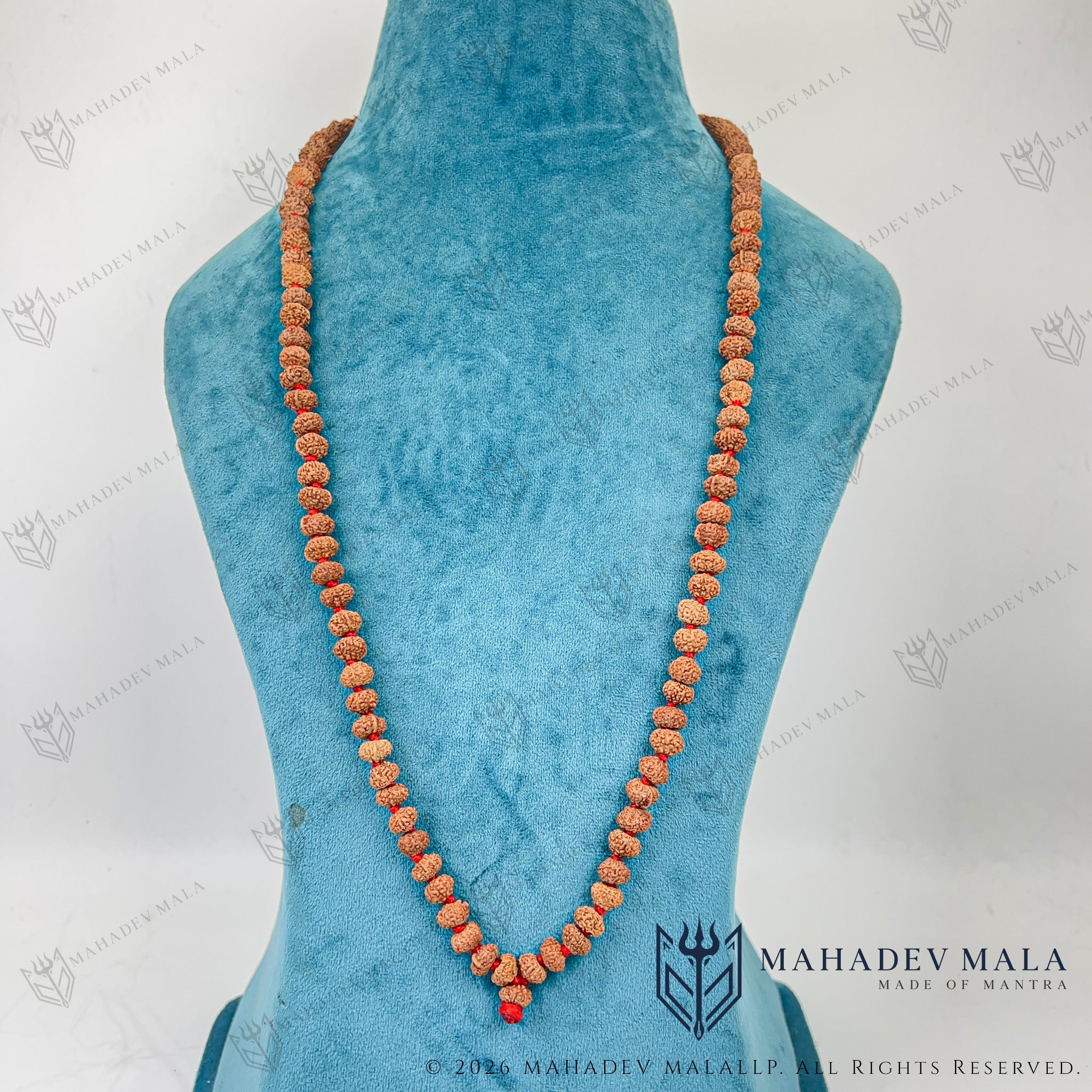9 Mukhi Ganesh Rudraksha Japa Mala displayed as a long necklace