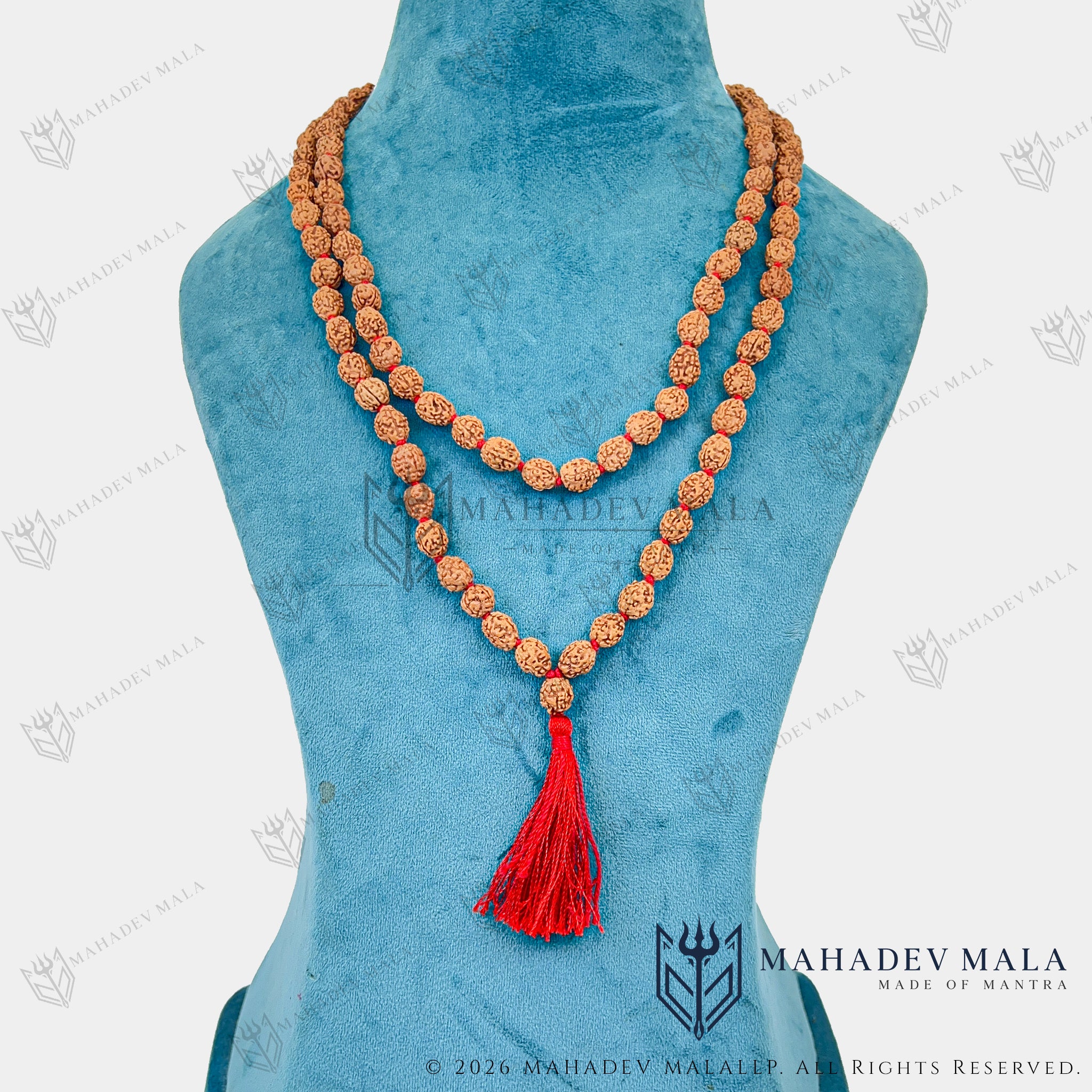 Additional worn view of Indonesian 4 Mukhi Rudraksha Japa Mala on a necklace display