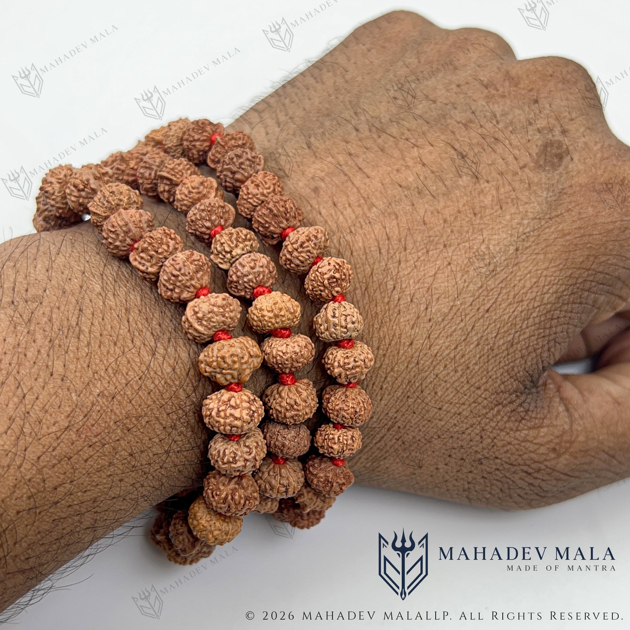 Indonesian 9 Mukhi Ganesh Rudraksha Japa Mala wrapped around the wrist